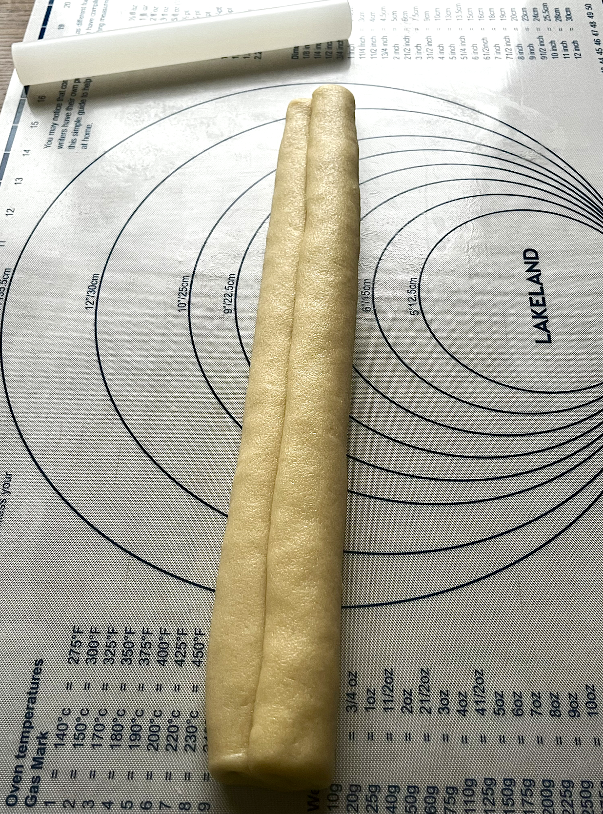 Dough rolled up after sugar is added