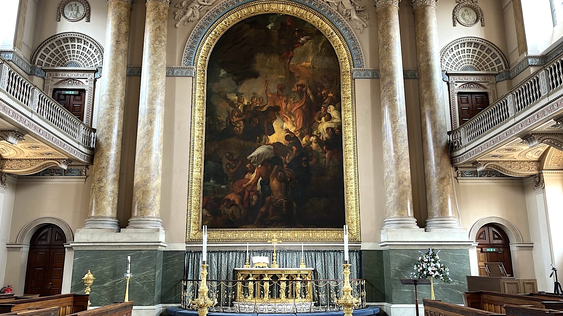 Main wall of the Chapel of St. Peter and St. Paul, featuring intricate Neoclassical details, ornate carvings, and decorative elements that highlight its architectural grandeur.