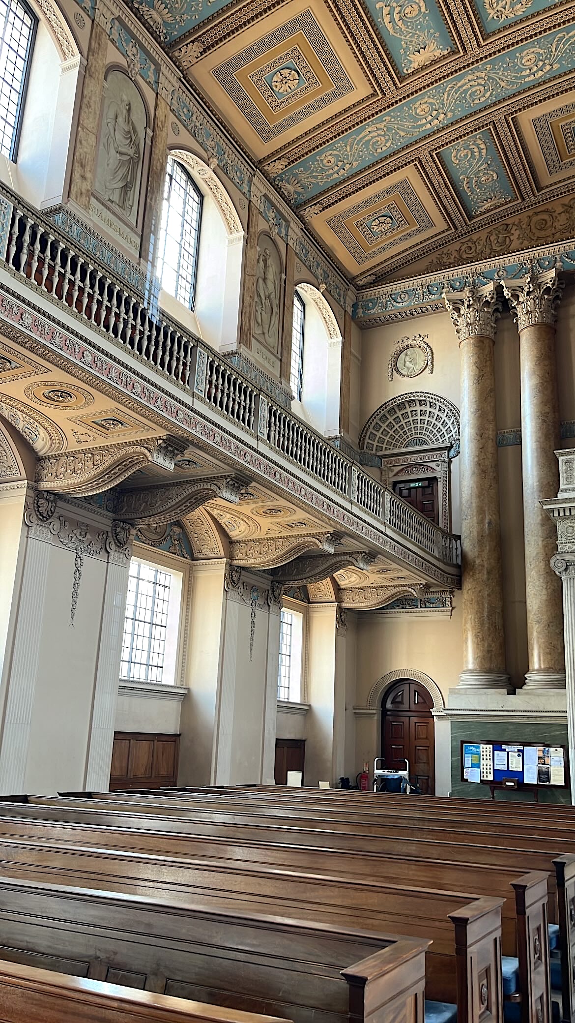 Wide view of the Neoclassical interior of the Chapel of St. Peter and St. Paul, showcasing its squares and octagons.