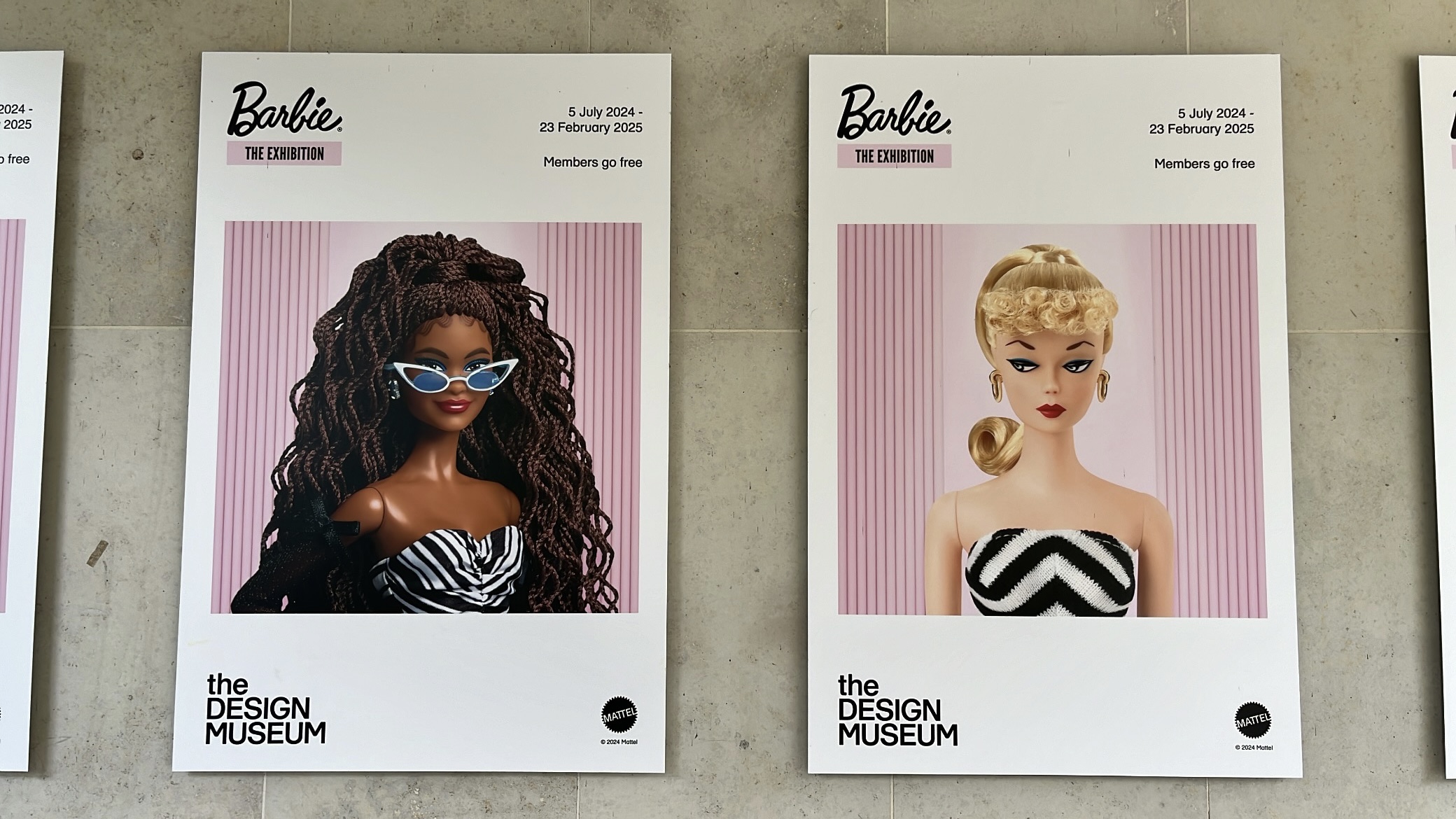 Vibrant posters from the Barbie exhibition at the Design Museum, highlighting iconic Barbie designs and the evolution of the famous doll's branding.