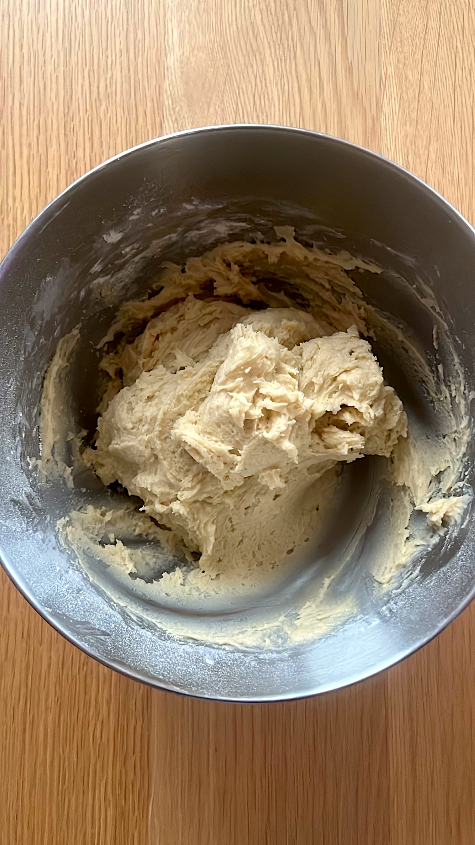 Flour being mixed into the butter, sugar, and egg mixture