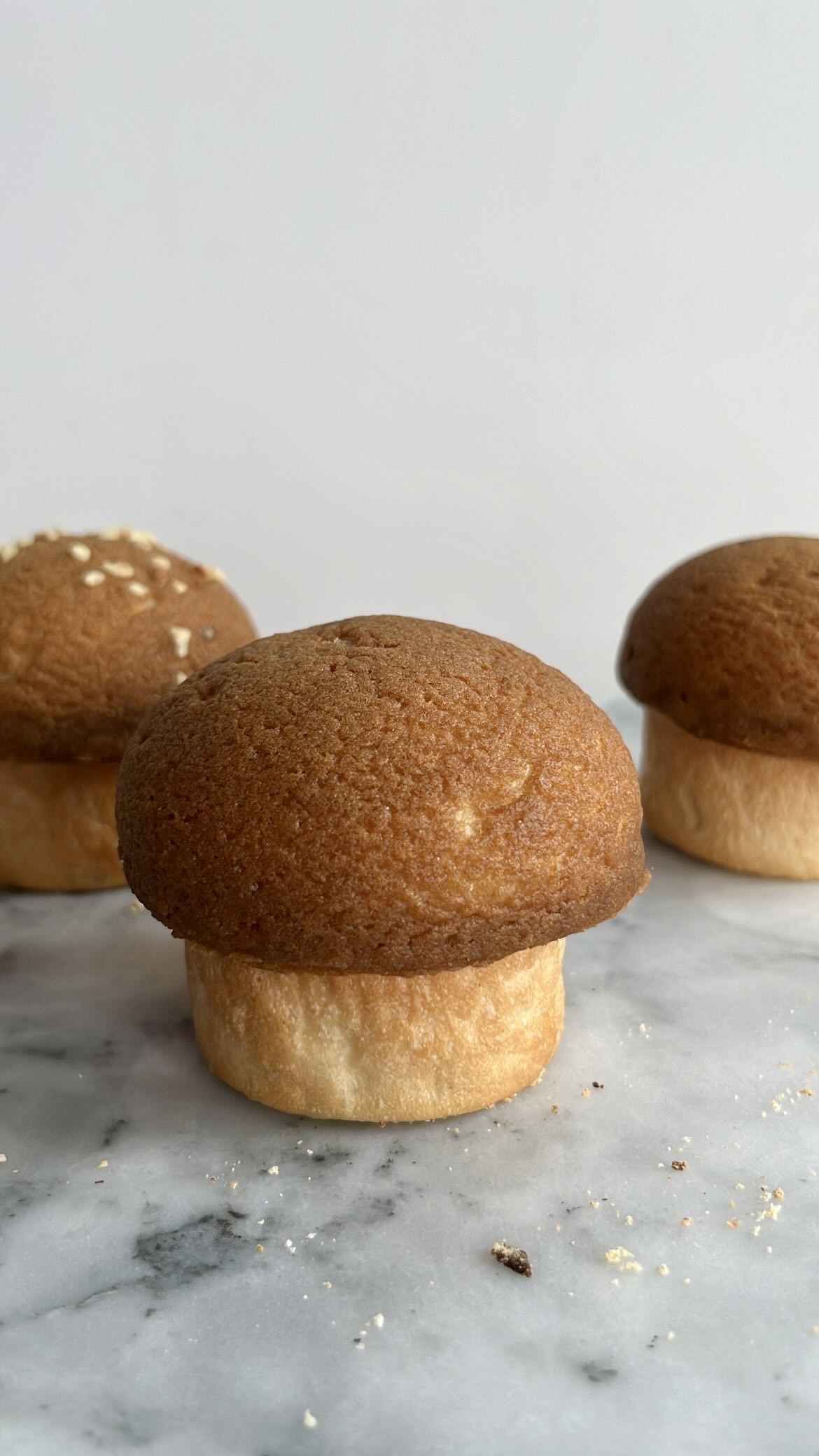 Bread in the shape of mushroom, with a crispy coffee top.