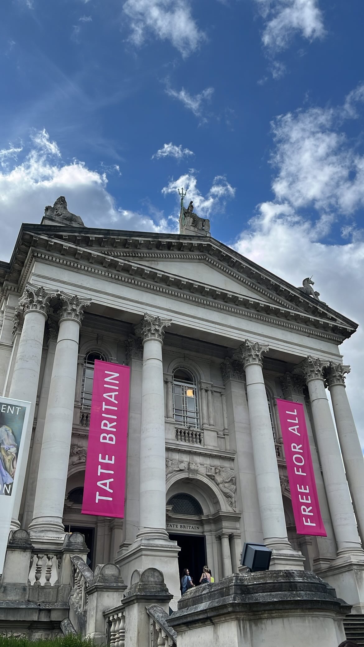 Exterior view of Tate Britain, showcasing its grand architecture and entrance. Linking to the page of Tate Britain.