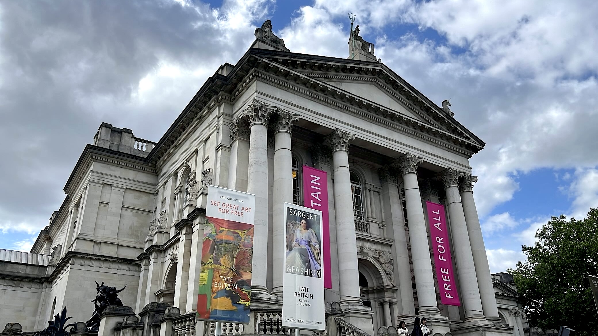 Exterior view of Tate Britain, showcasing its grand architecture and entrance.